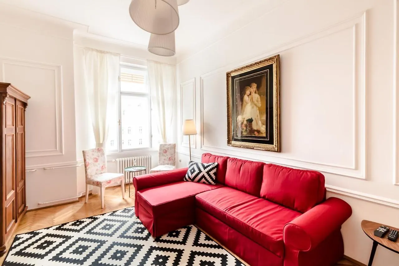 Golden Esthetic With Red Sofa Apartment Budapest