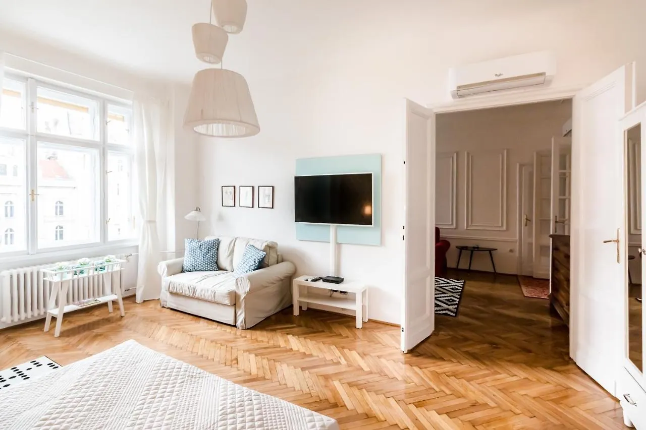Golden Esthetic With Red Sofa Apartment Budapest